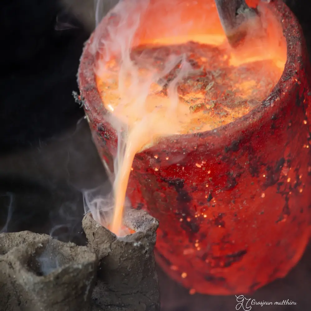 pouring the bronze 13